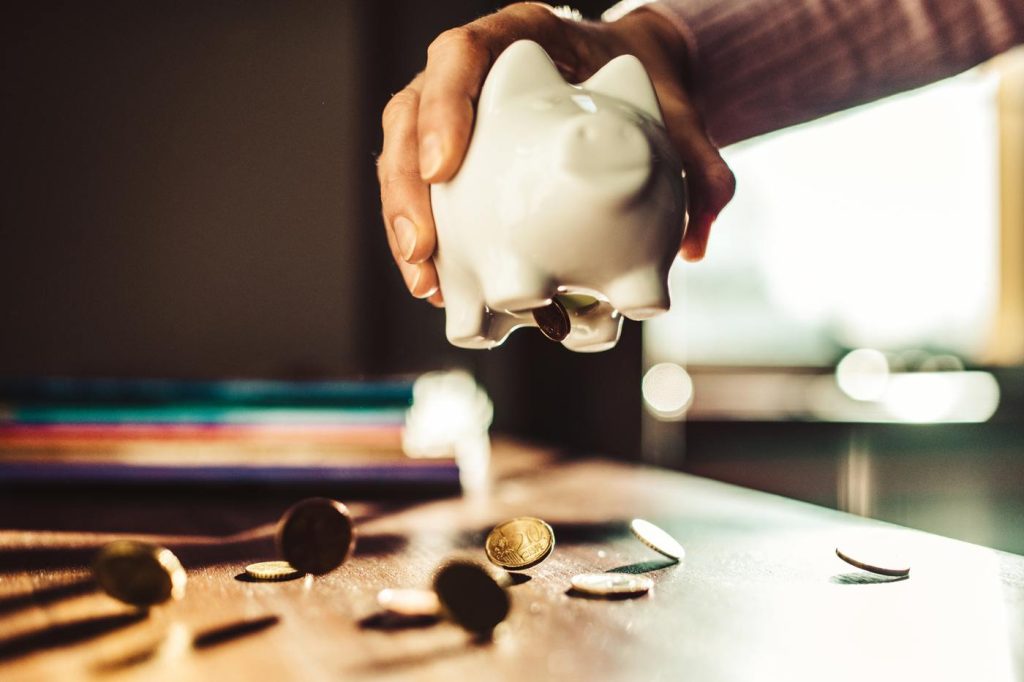 Half of Canadians admit to tapping savings to cope with higher costs, survey finds